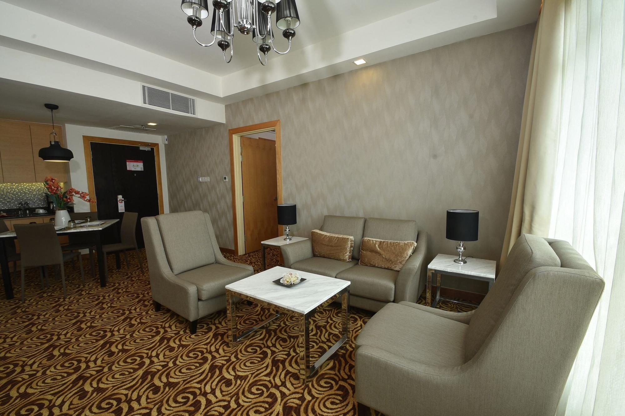 Tenera Hotel Bangi Eksteriør billede A living room in a suite at the hotel